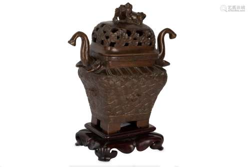 A CHINESE BRONZE INCENSE BURNER AND COVER.