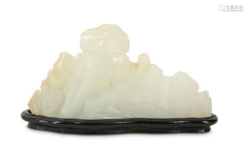 A CHINESE WHITE JADE 'MOUNTAIN' BRUSH REST.