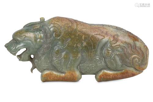 A CHINESE PALE CELADON JADE CARVING OF A QILIN.