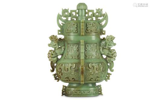 A MASSIVE CHINESE CELADON JADE ARCHAISTIC VASE AND COVER.