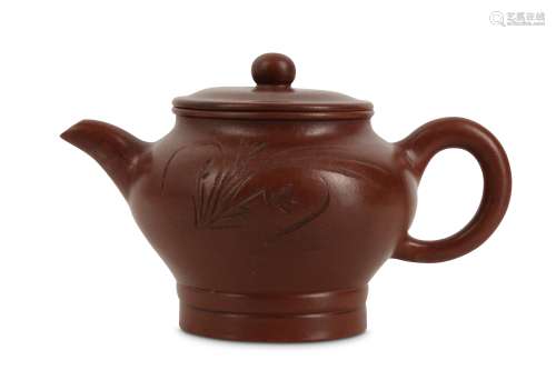 A CHINESE YIXING ZISHA TEAPOT AND COVER.