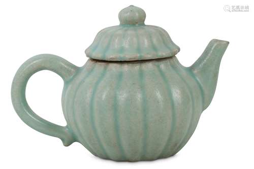 A CHINESE CELADON-GLAZED LOBED TEAPOT AND COVER.