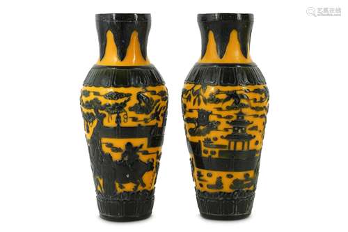 A PAIR OF CHINESE BEIJING BLACK OVERLAY YELLOW GLASS VASES.