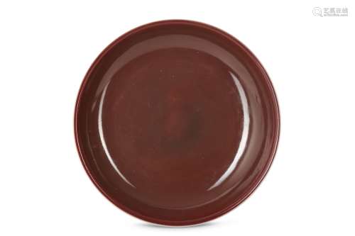 A CHINESE COPPER RED-GLAZED DISH.