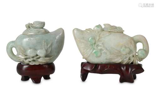 TWO CHINESE APPLE-GREEN JADEITE 'PEACH' TEAPOTS AND COVERS.