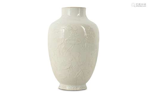 A CHINESE WHITE-GLAZED 'LOTUS POND' VASE.