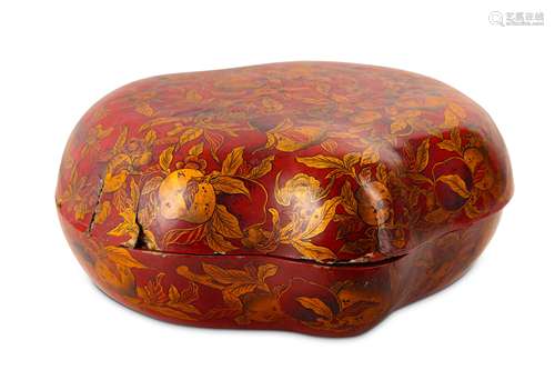 A CHINESE LACQUER PEACH-SHAPED BOX AND COVER.