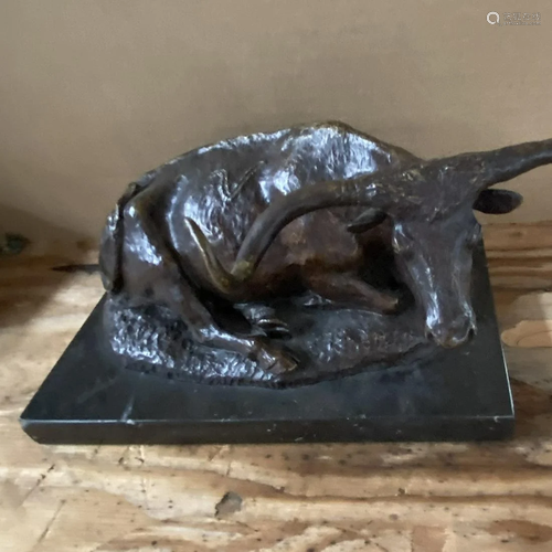 Bronze Sculpture of a Reclining Bull on a Blac…