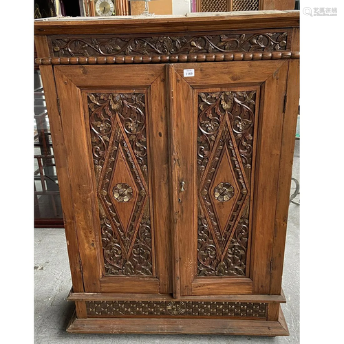 Carved Two Door Linen Press. Each door car…