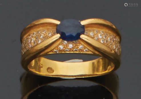 Bague en or jaune 18K (750) sertie d'un saphir et …