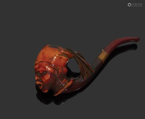 Pipe en bois sculpté figurant une tête d'africain,…