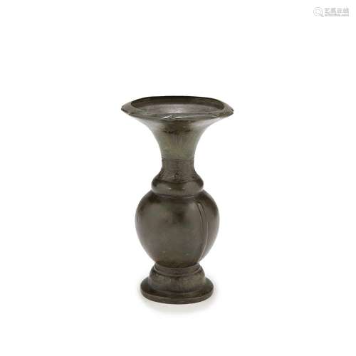 An archaistic bronze vase, China, Qing dynasty, 19th century. H.9 5/8 in.