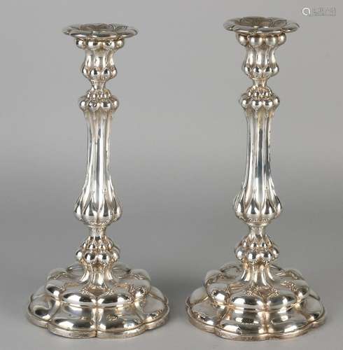 Two silver table candlesticks 800/000, on a round