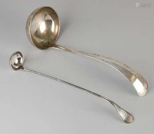 Two silver spoons, 833/000, a morellenlepel with a