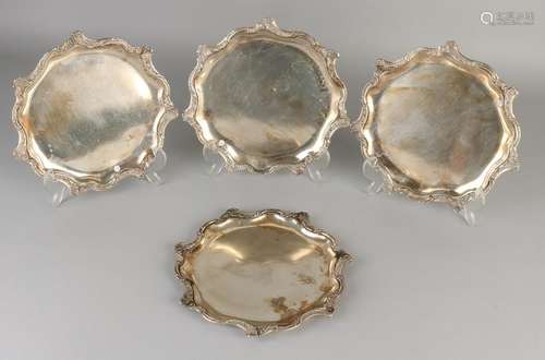 Four silver plates coasters, 800/000, round molded