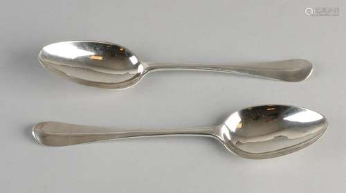 Two antique silver spoons. One times egg-shaped trough,