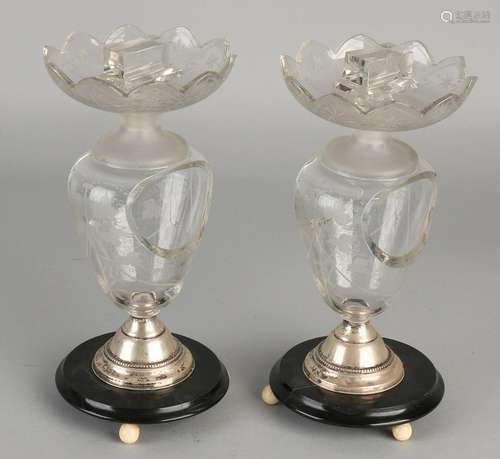 Two ornate crystal match holders with etched floral