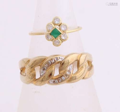 Two rings with stones, and a wide ring with a contended