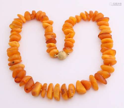 Collier of tumbled amber attached to a double