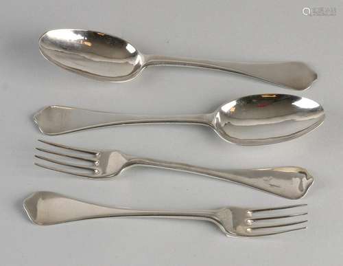 Two sets of antique silver place settings. Lepelbak