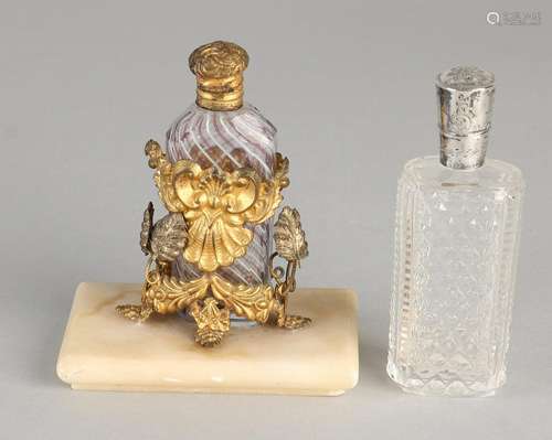 Two perfume bottle, including a special bottle from