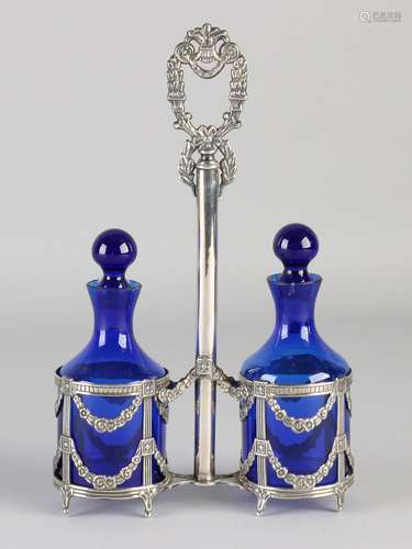 Oil and vinegar set with silver, 925/000. Silver holder