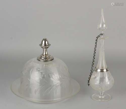 Cheese dome and decanter with silver 833/000. A crystal