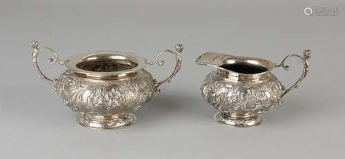 A small set of silver cream, 833/000, 2 part with a