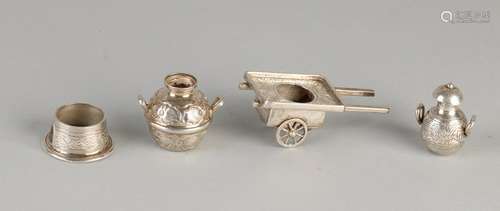 Four silver miniatures, 800/000, fitted with a cart,