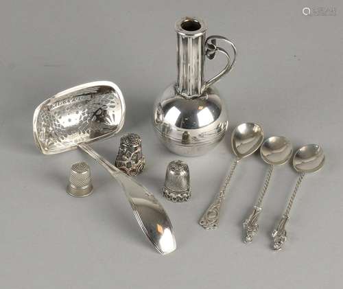 Lot silver with a sugar spoon, 835/000, having a