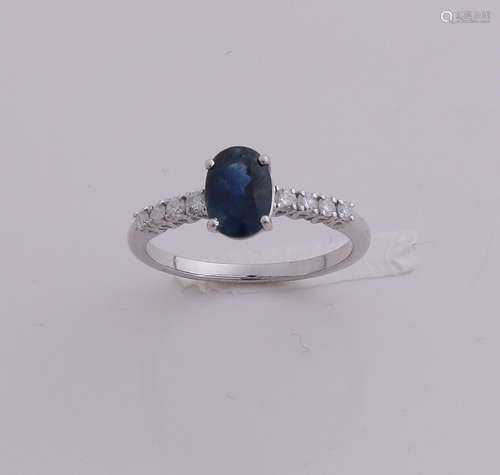 White gold ring, 585/000, with diamond and sapphire.