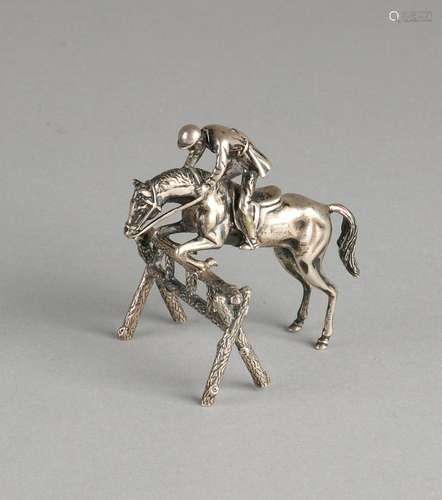 Silver miniature, 835/000, a jockey on horse jumping