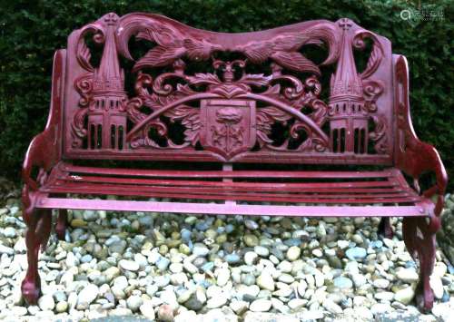 Large cast iron garden bench with arms and church