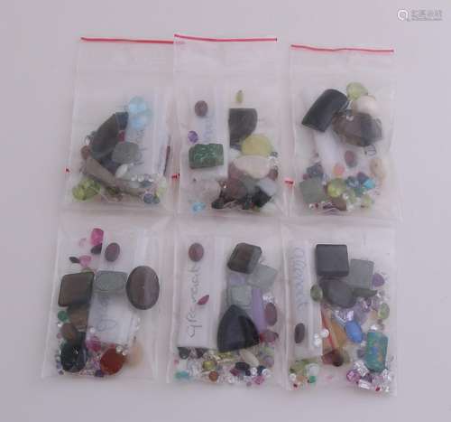 One lot gemstones with 2x 50 cents, to include tiger