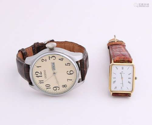 Lot 2 with watches, around one large model, Oozo, with