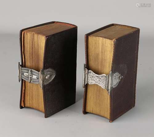 Two Bibles with silver clasp. Two bibles, The New