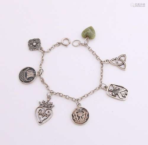 Silver bracelet with seven Celtic / Scottish charms,