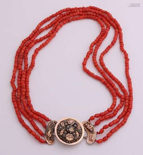 Necklace of coral with yellow gold clasp region,