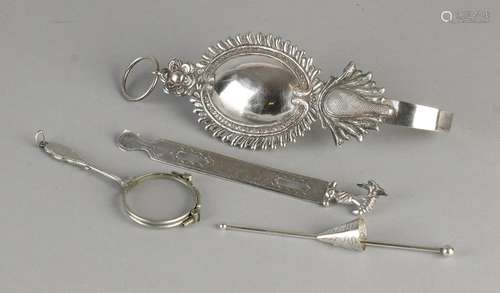 Four parts of silver with, inter alia, a embrasse with