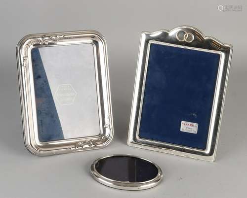 Lot with three silver photo frames, a rectangular frame