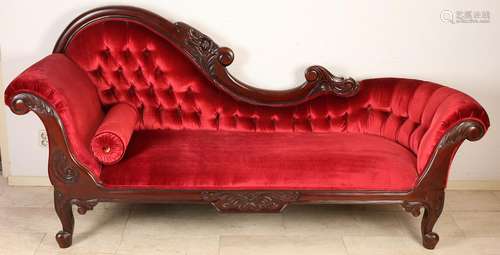 Large mahogany chaise lounge with red velvet upholstery