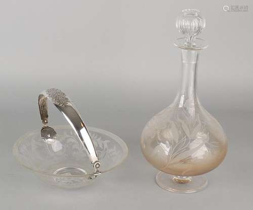 Two parts crystal with silver, a decanter and shell