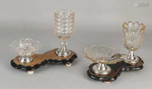 Two pieces of the table with crystal and silver,