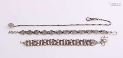 Three silver watch chains, a braided model with