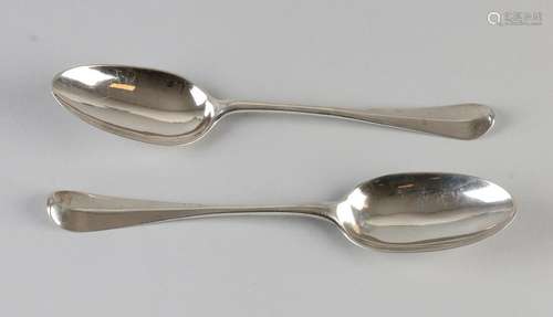 Two antique silver spoons. One time in Amsterdam