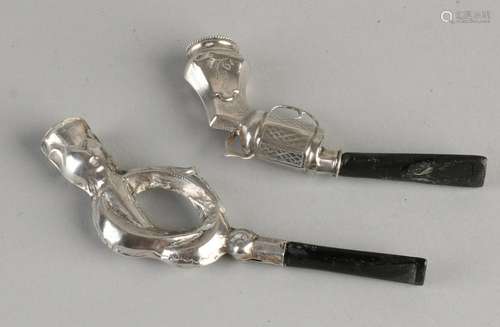 Two antique silver groom pipes, 833/000, one in the