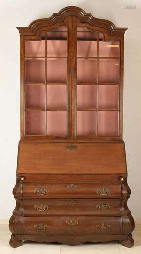 Dutch oak writing cabinet with glass design books.