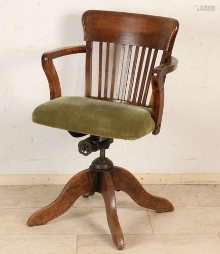 Antique English oak desk with swivel seat. Circa 1900.