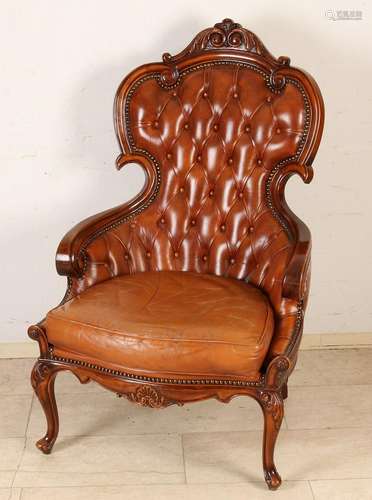 Italian walnut armchair with brown leather trim. Second