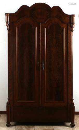 Biedermeier mahogany two-door cabinet with bowed head.